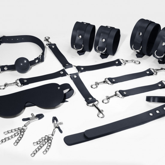 Набор Feral Feelings BDSM Kit 7 Black, наручники, поножи, коннектор, маска, паддл, кляп, зажимы